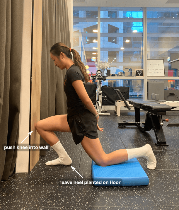 Half kneeling ankle rocks